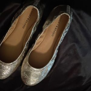 Gold ballerina size 9. Bought for wedding but fit to snug.